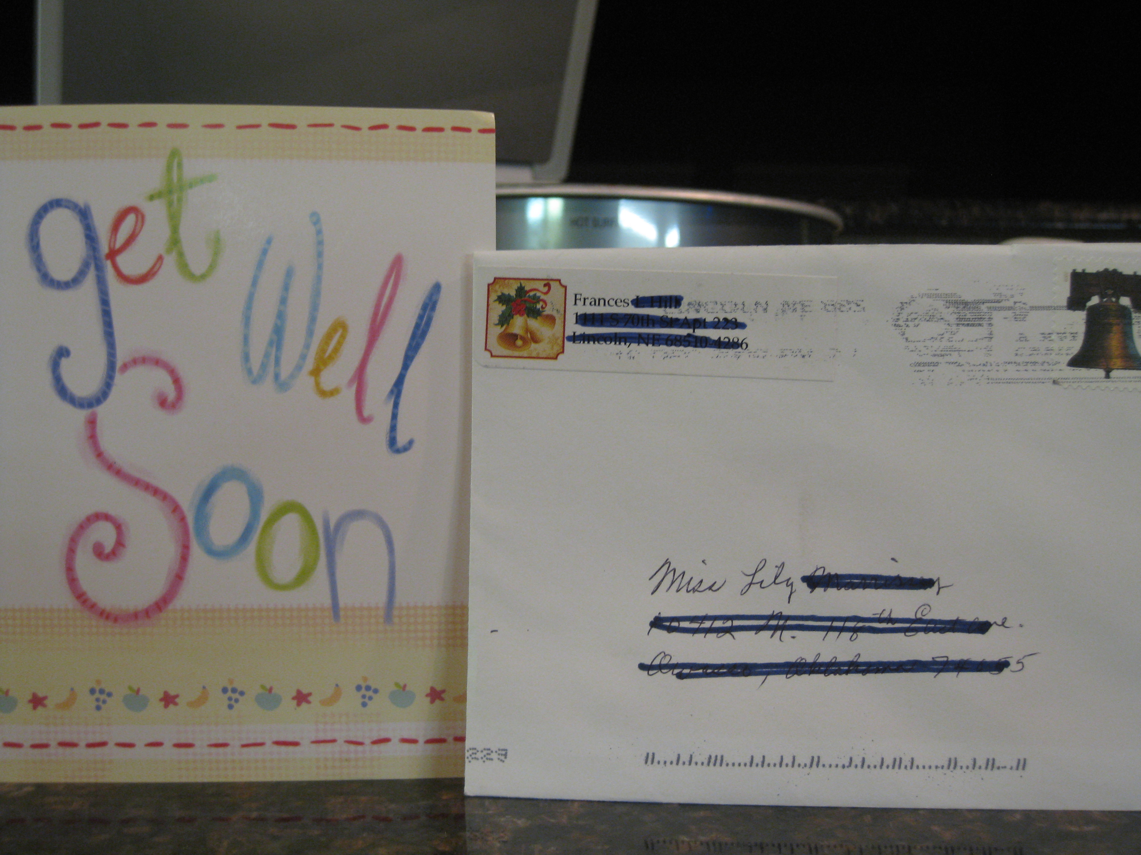 Mail addressed to "Miss Lily M." -- a Get Well Soon card from Grandma H