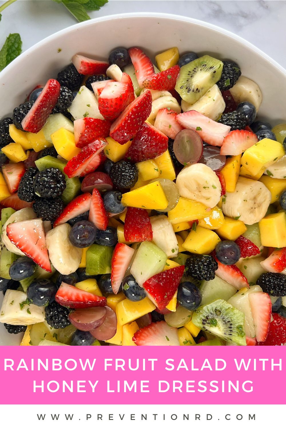 Rainbow Fruit Salad with Honey Lime Dressing via @preventionrd